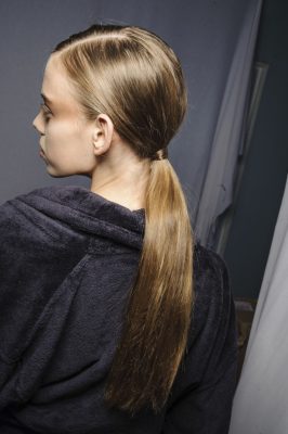 High-shine ponytails are the secret to squeezing in a quick treatment on the go. Spritz your favourite leave in conditioner to your roots and ends and pull back into a sleek no fuss up-do.Dries Van Noten