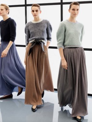 Skirts and Knits: Decidedly preppy but also demure, designers paired skirts of varying lengths with super soft knits and jumpers. (Image Giorgio Armani)
