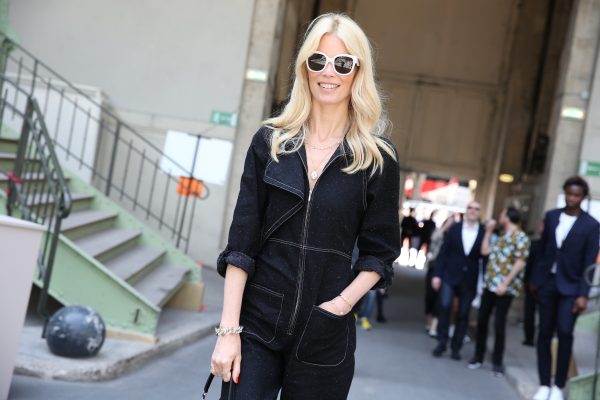 Chanel Haute Couture AW17: Claudia Schiffer never fails to disappoint, and is seen here with shoulder-length platinum blonde tresses, bold eyewear and a modest black, classically Parisian, ensemble.