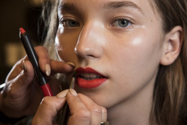 The Lip: Giambattista Valli goes back to basics with a bold and seductive red lip. A classic and universally beloved pout, models's bee stung lips popped amongst the rich and regal hues that achieved minimalism and extravagance simultaneously.