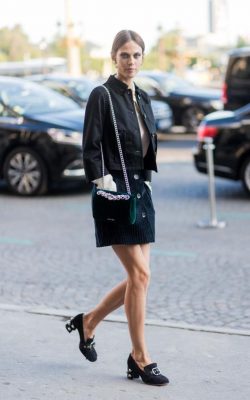 A shirtdress and low-heeled shoes combined with a statement bag is the epitome of Parisian chic.