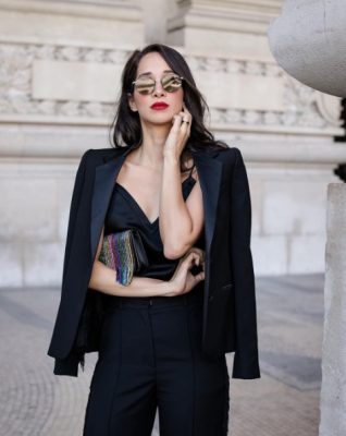Lana El Sahely strikes a pose between shows in a black Racil blazer