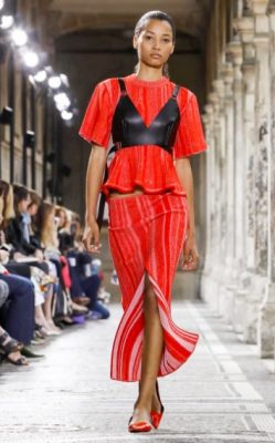 Jack McCollough and Lazaro Hernandez had a change of scene from their native New York, showing Provenza Schouler's spring/summer18 in Paris, punctuating their collection's largely monochrome palette with intense pops of red.