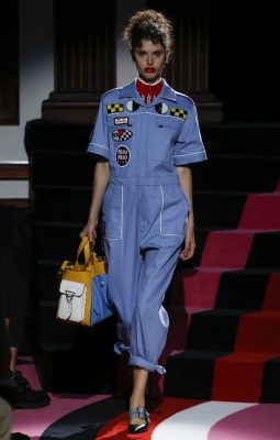 Miu Miu's Resort 2018 collection also showed on Day one, with Miuccia Prada selecting the Paris Automobile Club as her venue. The collection featured plenty of racing motifs such as checkered flags, mechanic's overalls and vintage appliqué badges and branding.