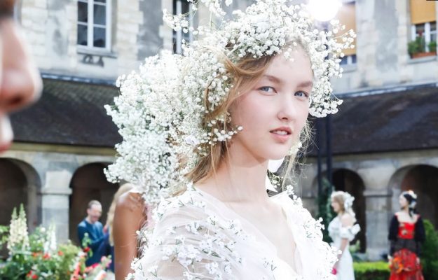 Rodarte spring/summer18 (ready-to-wear)  A breath of fresh spring air, Rodarte’s models were adorned with bouquets and petals of baby’s-breath flowers blended into flowing hair while faces were fresh with a light dusting of pink blush upon the apples of the cheeks to create the illusion of the season’s flush