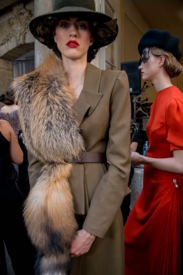 The Scarf: Intimidating silhouettes are theatrical and opulent at Ulyana Sergeenko, who ensures couture pieces transcend costumes with exquisite detailing decisions. Thick fur scarves are draped upon ladylike dresses and Forties-inspired suits for a timeless and classic fashion mosaic.