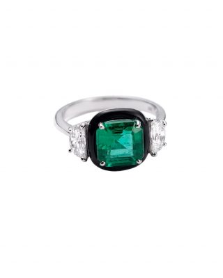 Minimal, yet striking, this Nikos Koulis statement ring is something else altogether. A chunky, elegant emerald takes centre stage, and the silver band really makes the colour pop.