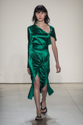 Dion Lee: Plisse pleats, handkerchief skirts and opulent silks in jewel tones brought together Dion Lee's two world's of New York and Sydney. Providing versatile options for work and play, Lee offered up plenty for his jet-set, high profile clients.