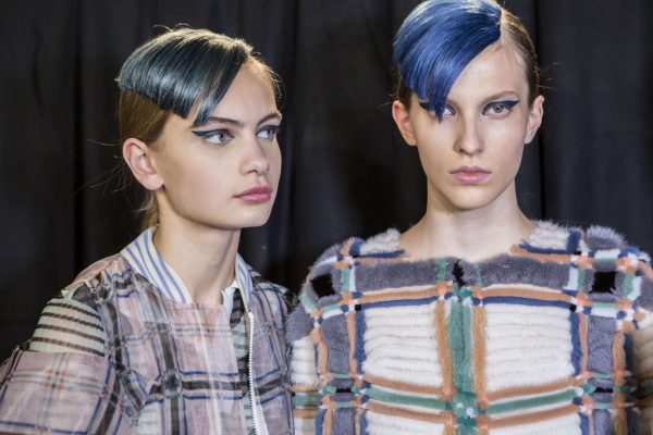 Fendi reignites our obsession with mermaid hair, styling models with blunt, sci-fi side fringes in blue and green