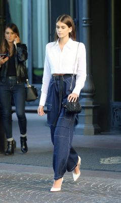 Kaia Gerber’s billowing trousers with cargo pockets and contrast stitching somehow work exceptionally well, thanks to the model’s button-down cropped shirt that allows for an ultra-feminine silhouette that’s emphasised with a utilitarian belt