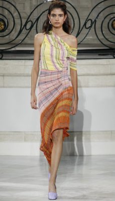 Peter Pilotto: Mixed mediums set the tone at Peter Pilotto - candy stripes, asymmetric checks and retro florals and paisleys echoed the Seventies, but the cuts and shapes on the runway were anything but nostalgic. Shirred slip dresses, sharp shirts and silky tracksuits in dreamy hues were spot on for a fuss-free summer wardrobe.