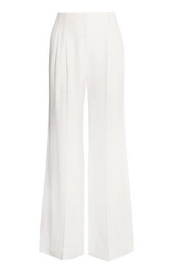 Emilia Wickstead’s Kos satin-crepe wide-leg pants boast impeccable tailoring that splits the fabric at the waistline, thus achieving the ultimate in volume. Tuck in a pastel-hued blouse for ethereal beauty