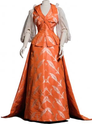 Charles Frederick Worth is generally considered to be the inventor of Parisian haute couture. It was he who created this orange silk dress with feather motifs, a dress of particularly luxurious quality, commissioned by Mrs Franklin-Gordon Dexter.