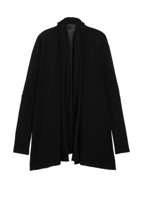This beautiful draped cashmere cardigan is soft and light, with an angular hem that’ll emphasis and flatter your exposed stomach. Extremely modern, this piece is extremely versatile, and will also work well with casual worn-in jeans and a pair of Gucci loafers.