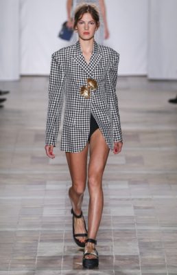 Sonia Rykiel: Oysters served as Julie de Libran's rather unusual inspiration for spring/summer18. She referenced the tiny molluscs through prints depicting them, pearl embellishments and shiny silk chartreuse dresses. Oysters aside, the opening gingham print pieces and crochet dresses are sure to please those looking for effortless summer dressing.