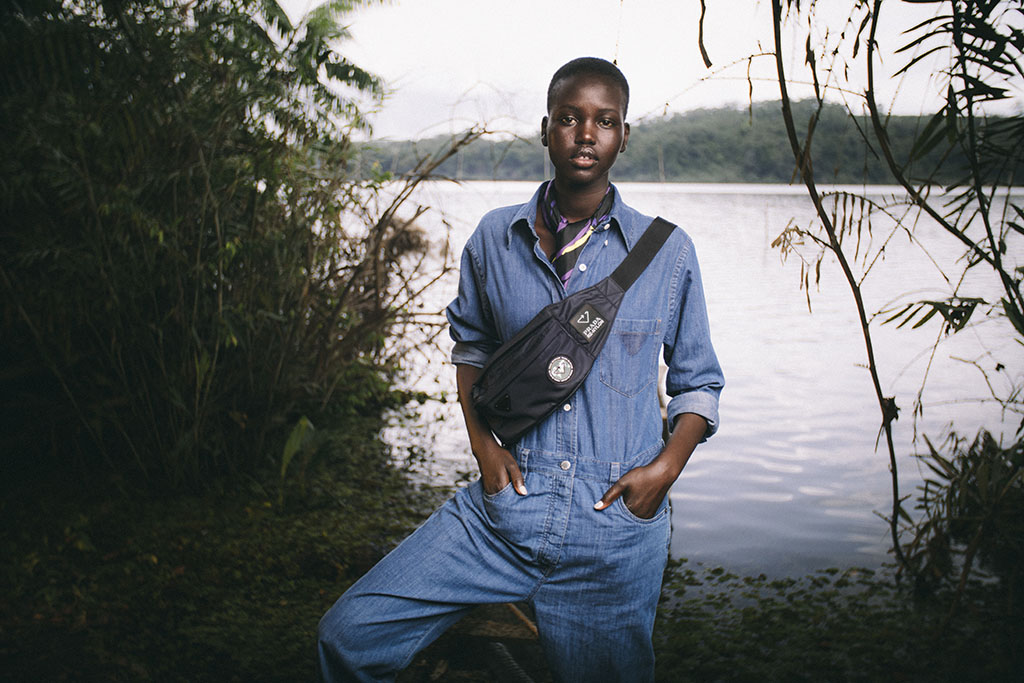 Sudanese-Australian model Adut Akech Bior, a former refugee, photographed in Cameroon wearing a Prada bumbag made from recycled nylon from discarded fishing nets