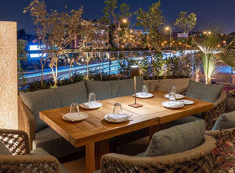 Table and chairs at Roka Restaurant in Riyadh