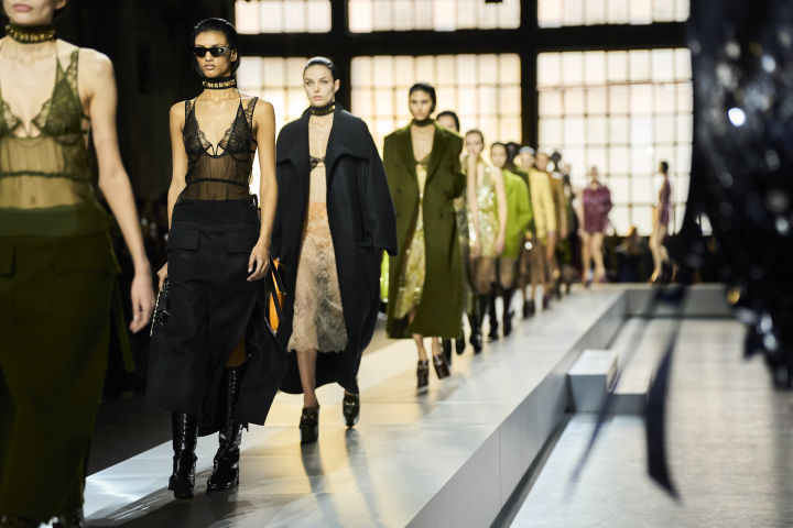 fashion show models walking on runway