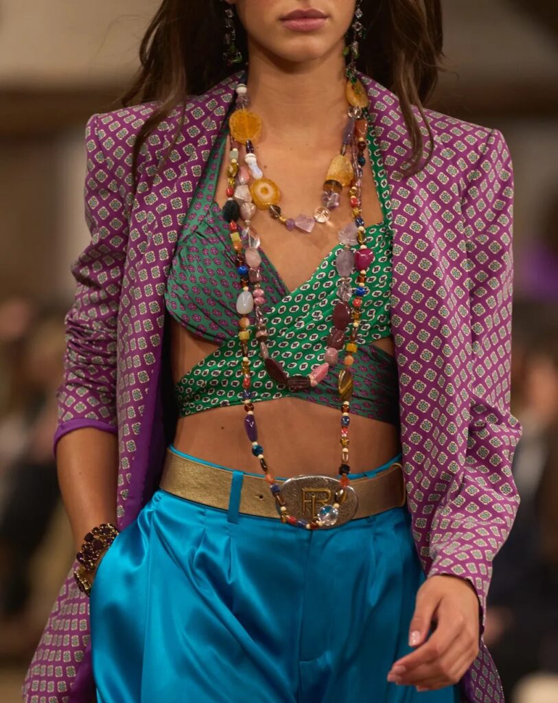 Woman catwalk colourful outfit long necklaces
